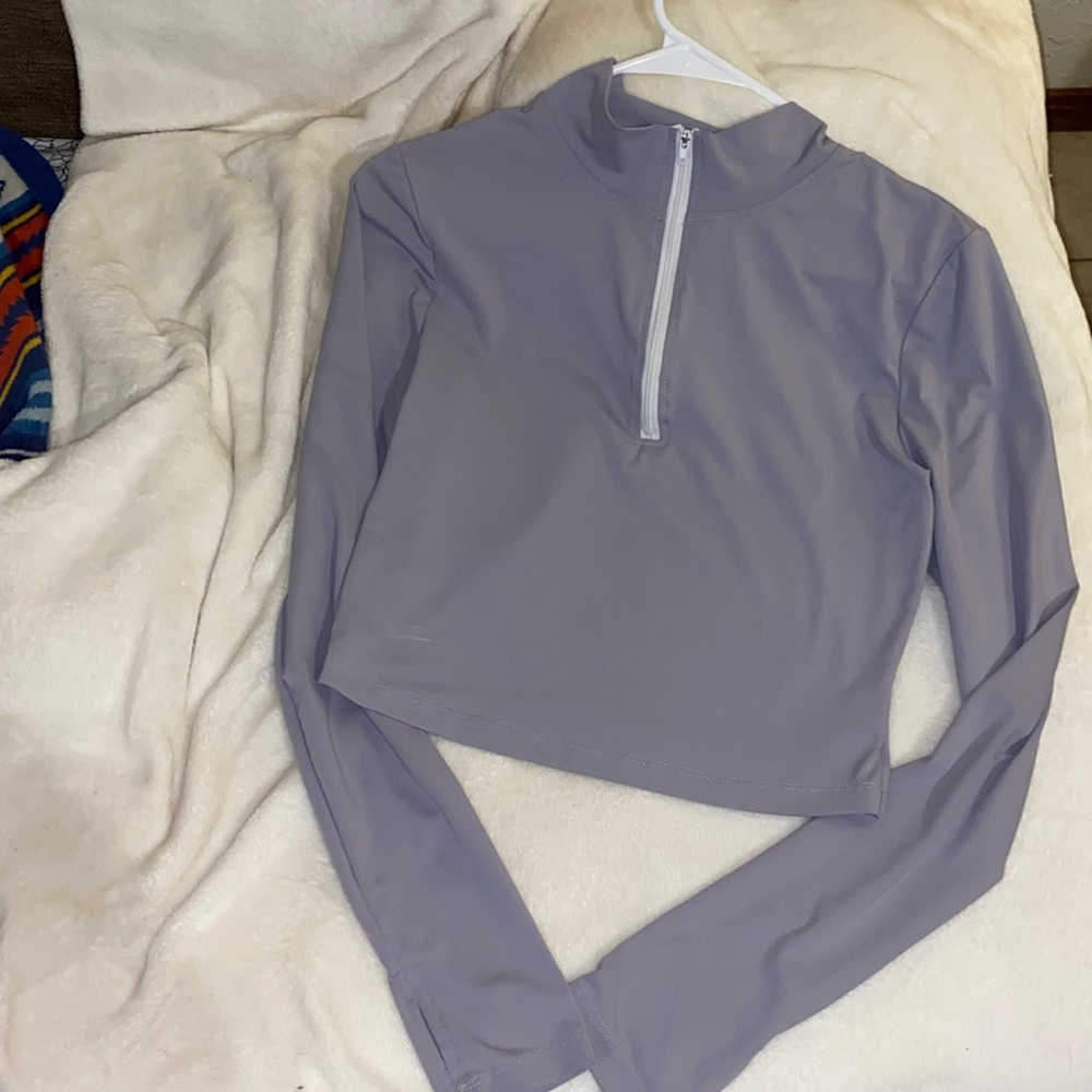 Grey half zip up active wear jacket, size S in women’s